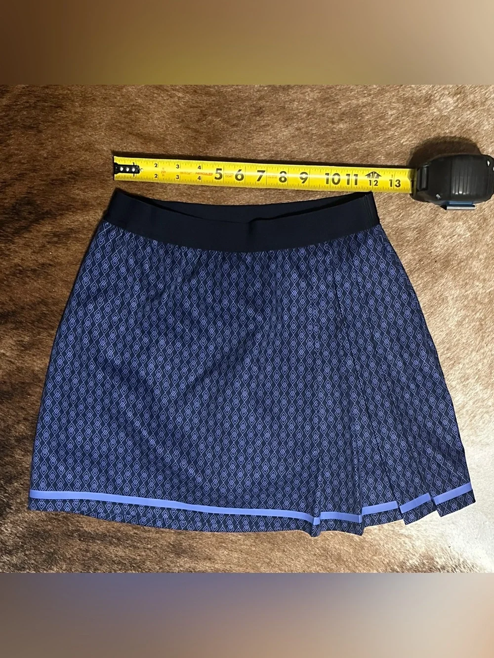 Like new golf set Sleeveless Polo with matching skirt Navy and Light Blue Trim